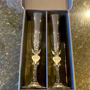 Heart shaped stem champagne flutes for anniversary and wedding toasts